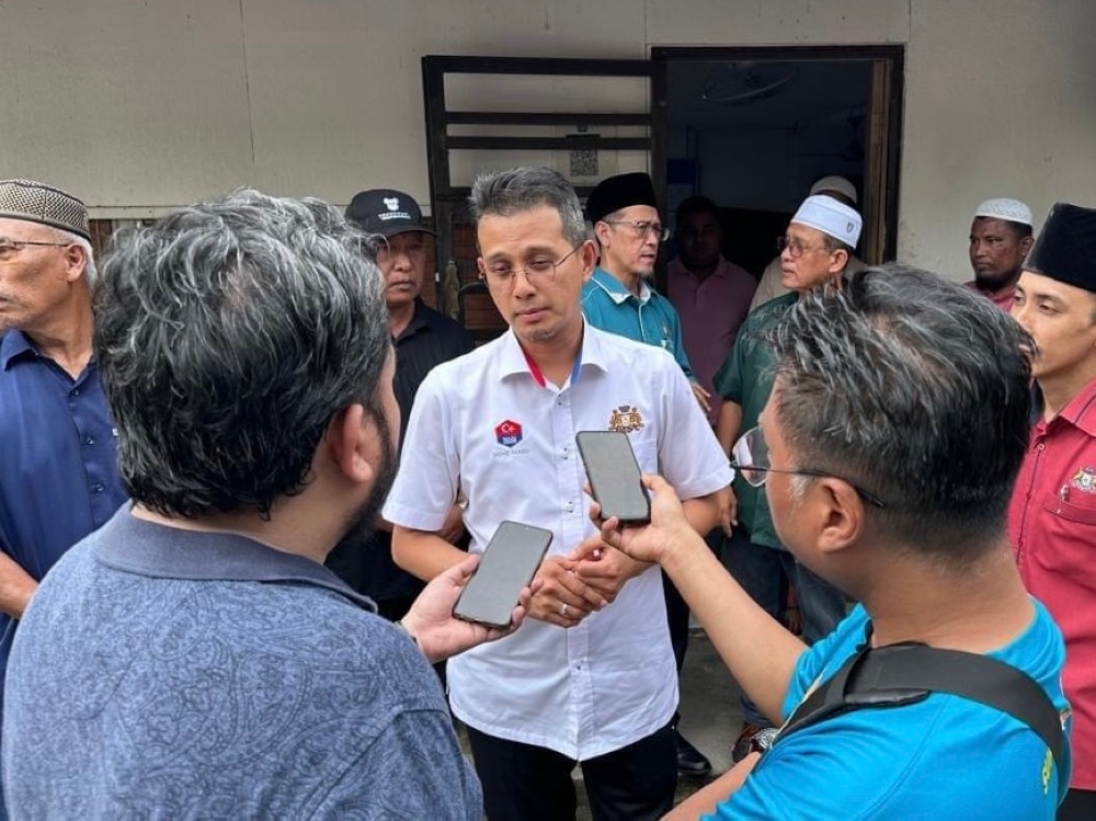 Johor exco in charge of Islamic affairs Mohd Fared Mohd Khalid speak to reporters outside the Kampung Plentong Baru Islamic Centre near Johor Baru May 20, 2024 — Picture via Facebook/Mohd Fared Mohd Khalid