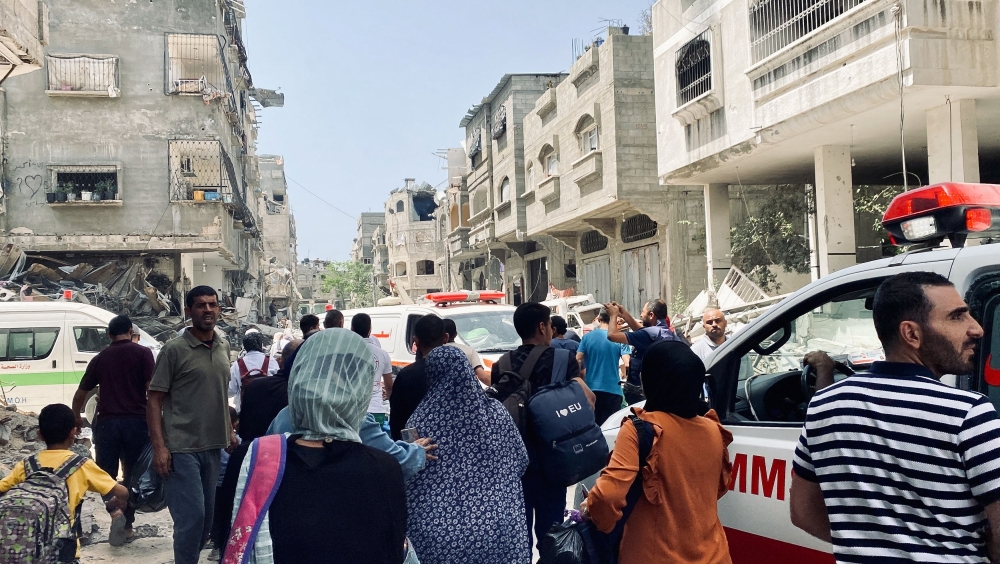 Palestinians evacuate Kamal Adwan hospital following an Israeli strike, amid the ongoing conflict between Israel and the Palestinian Islamist group Hamas, in Beit Lahia in the northern Gaza Strip, May 21, 2024. — Reuters pic