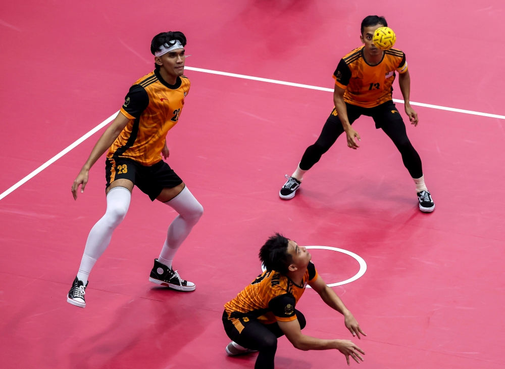 The Malaysian sepak takraw team in action against Myanmar in the semi-finals of the Sepak Takraw World Cup yesterday. — Bernama pic