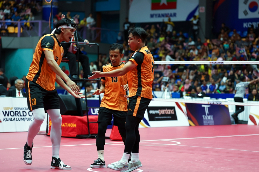 The Malaysian sepak takraw team in action against Myanmar during the semi-finals of the World Cup last night. — Bernama pic