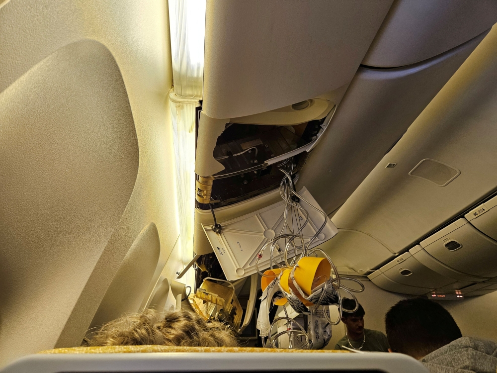 The interior of Singapore Airline flight SQ321 is pictured after an emergency landing at Bangkok’s Suvarnabhumi International Airport yesterday. — Reuters pic