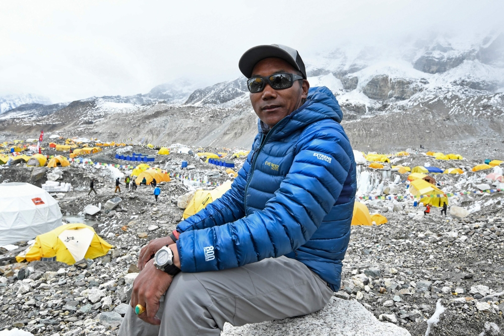 Nepali climber Kami Rita Sherpa broke his own record May 22, 2024 as the person to have scaled Mount Everest the most times, achieving the milestone 30th ascent of the world's highest peak. — AFP pic