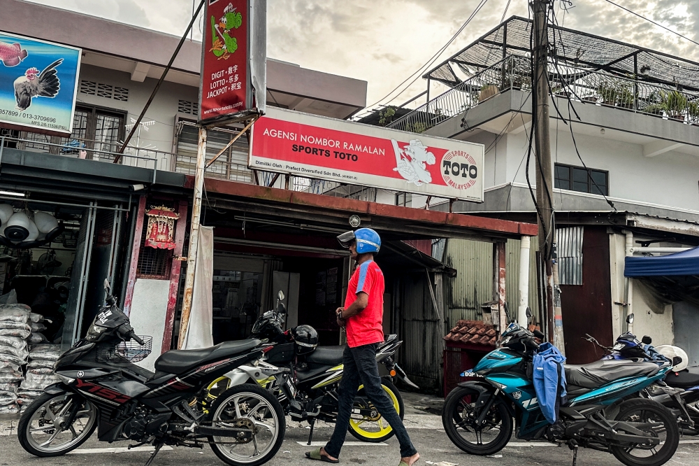 A Sports Toto lottery shop pictured in Selayang Baru, May 22, 2024. A licensed number forecast operator and four others are seeking leave at the Court of Appeal to commence a legal challenge against the Perlis state government’s decision to halt license renewal for gaming outlets in the state capital. — Picture by Hari Anggara 