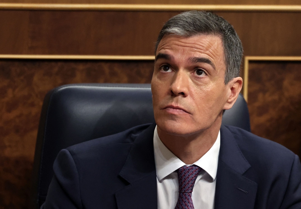 Spanish Prime Minister Pedro Sanchez defended his wife against graft allegations yesterday, just days after Argentina’s president sparked a diplomatic row by calling her ‘corrupt’ at a conference of far-right leaders in Madrid. — AFP pic