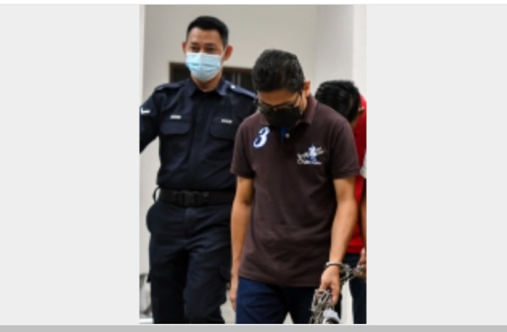Mukfarnizan Mukhtar, 41, a student management assistant at the school, is accused of committing physical sexual assault on the 14-year-old girl in the school toilet at 9am on November 24, 2022. — Bernama pic 