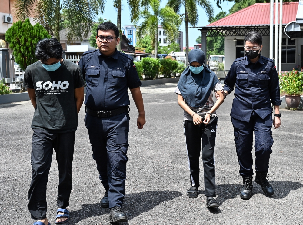 Nur Aisyah Azila Zairul Akmal, 21, and Muhammad Alhafiz Mukminin Mohd Noor, 24, made the confession after the charges were read against them, before Judge Wan Suhaila Mohd. — Bernama pic 
