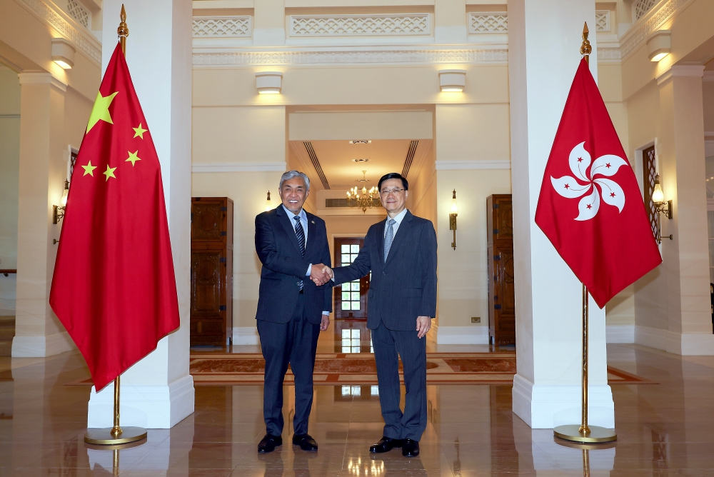 Deputy Prime Minister Datuk Seri Ahmad Zahid Hamidi with John Lee Ka-chiu during a courtesy visit to the Chief Executive of the Hong Kong Special Administrative Region (HKSAR) at Government House in Hong Kong, May 23, 2024. — Bernama pic 