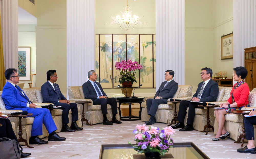 Deputy Prime Minister Datuk Seri Ahmad Zahid Hamidi meets with John Lee Ka-chiu during a courtesy visit to the Chief Executive of the Hong Kong Special Administrative Region (HKSAR) at Government House, May 23, 2024. Malaysia and Hong Kong have agreed to collaborate in the field of Technical and Vocational Education and Training (TVET) as well as the economy for mutual benefit. — Bernama pic 