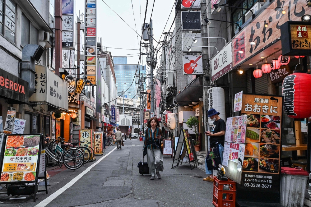 Japan's Consumer Price Index excluding volatile fresh food prices eased from a 2.6 per cent year-on-year rise in prices logged in March by the internal affairs ministry. — AFP pic