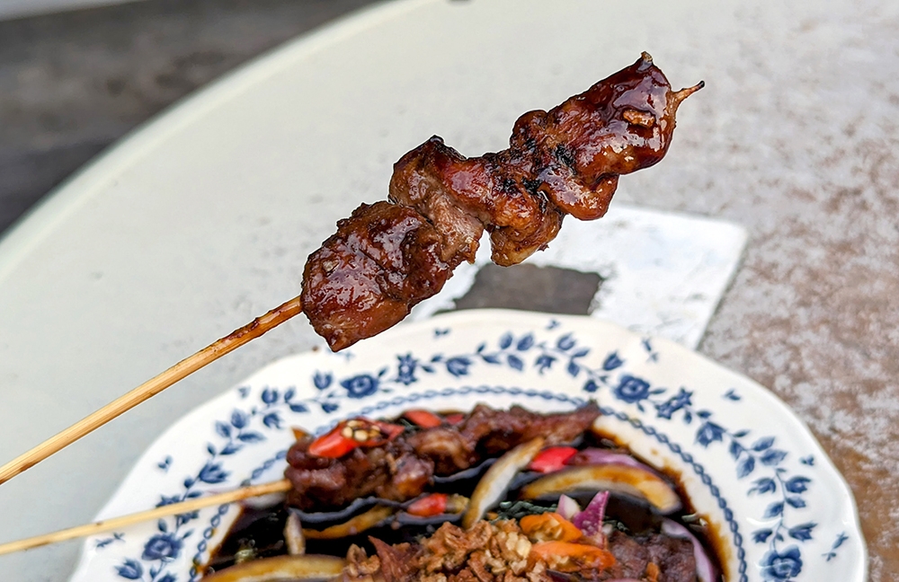 'Sate kambing' has a stickier, glossier exterior from the thick–as–molasses helping of 'kicap manis'.