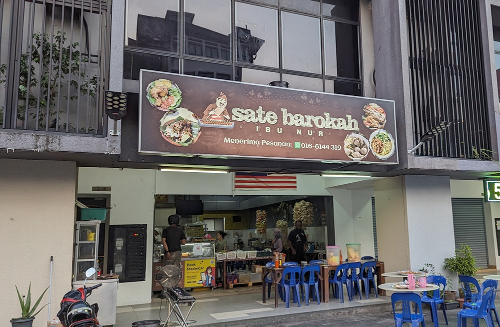 Look for the sign along this row.