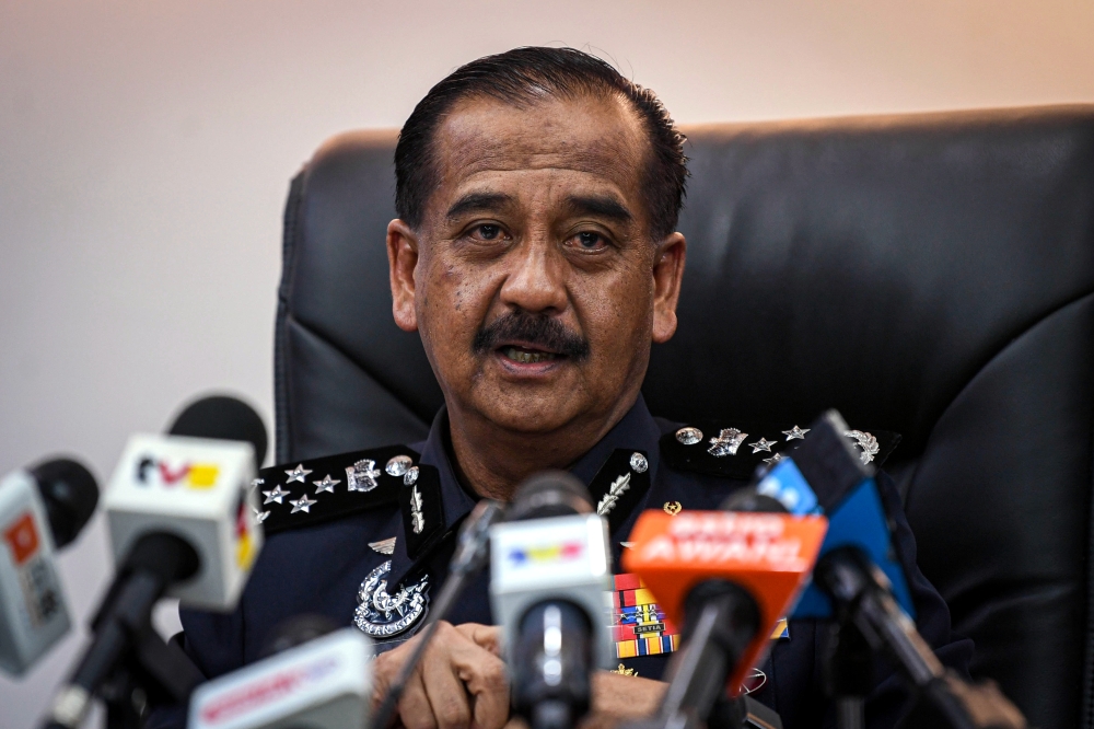 Inspector-General of Police Tan Sri Razarudin Husain speaks during a press conference in Kuala Lumpur May 24, 2024. — Bernama pic