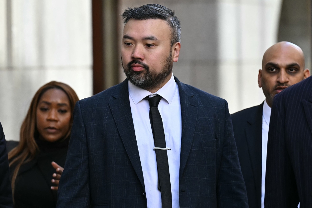 Chi Leung Wai arrives to attend a hearing at the Old Baily in central London on May 24, 2024 over allegations of assisting Hong Kong's intelligence services in a Chinese-linked espionage case. — AFP pic
