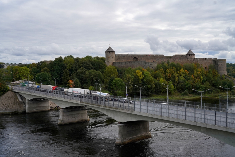 A general view of the bridge over Narva river at the border crossing point with Russia in Narva, Estonia September 18, 2022. — Reuters pic  