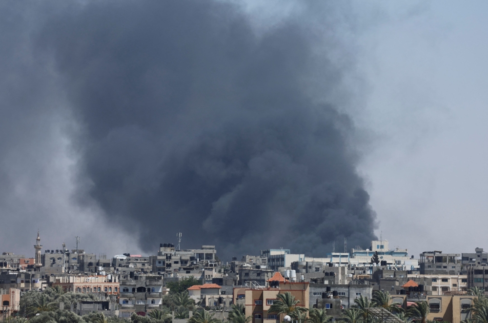 Smoke rises during an Israeli air strike, amid the ongoing conflict between Israel and Hamas, in Rafah, in the southern Gaza Strip May 24, 2024. — Reuters pic