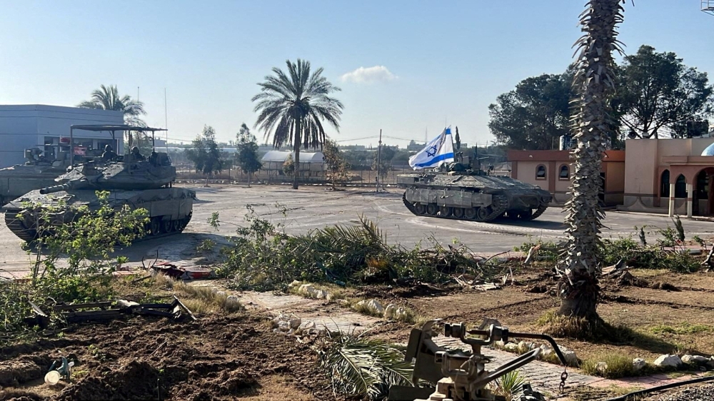 File photo of Israeli military vehicles operating in the Gazan side of the Rafah Crossing, amid the ongoing conflict between Israel and Palestinian group Hamas, in the southern Gaza Strip, in this handout image released on May 7, 2024. — Reuters pic
