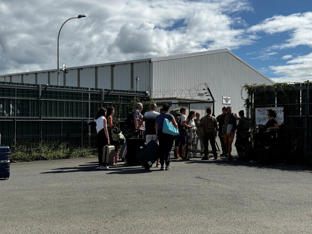 The first evacuation flights for tourists stranded in France’s Pacific territory of New Caledonia took off yesterday, the high commission in the archipelago said, as President Emmanuel Macron’s government sought to defuse the crisis. — Reuters pic