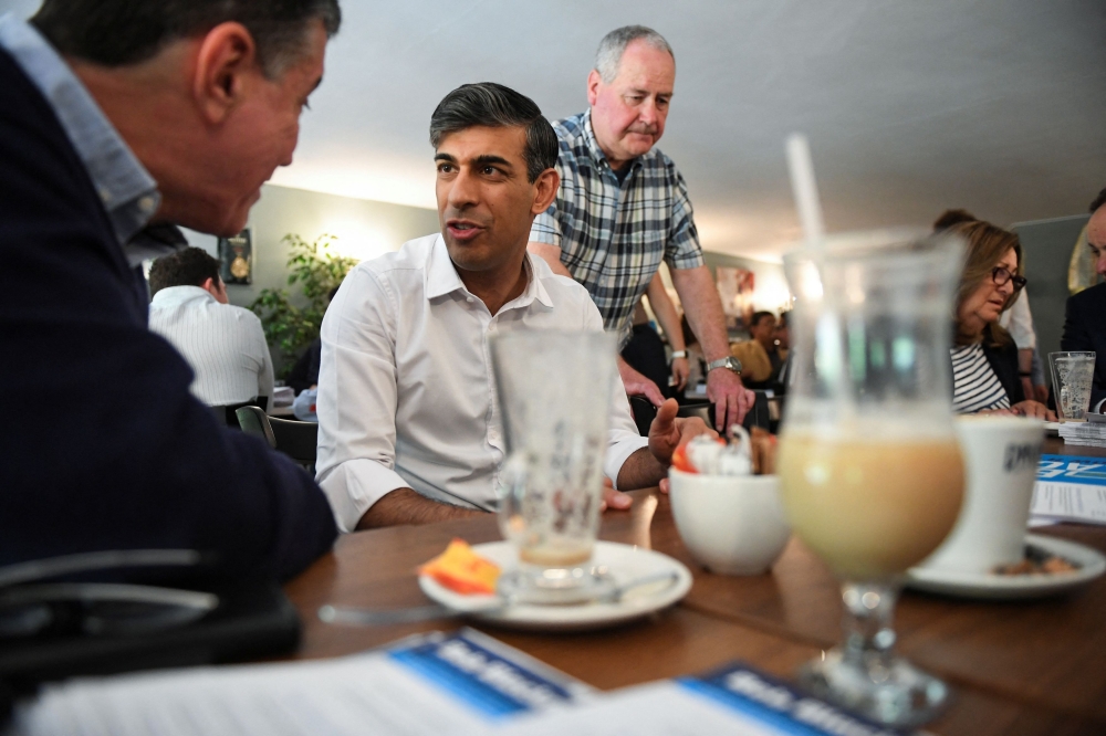 Rishi Sunak’s Conservatives lag Labour by a wide margin in opinion polls, which have shown little change in fortunes for the prime minister since his surprise election call last Wednesday. — Reuters pool pic