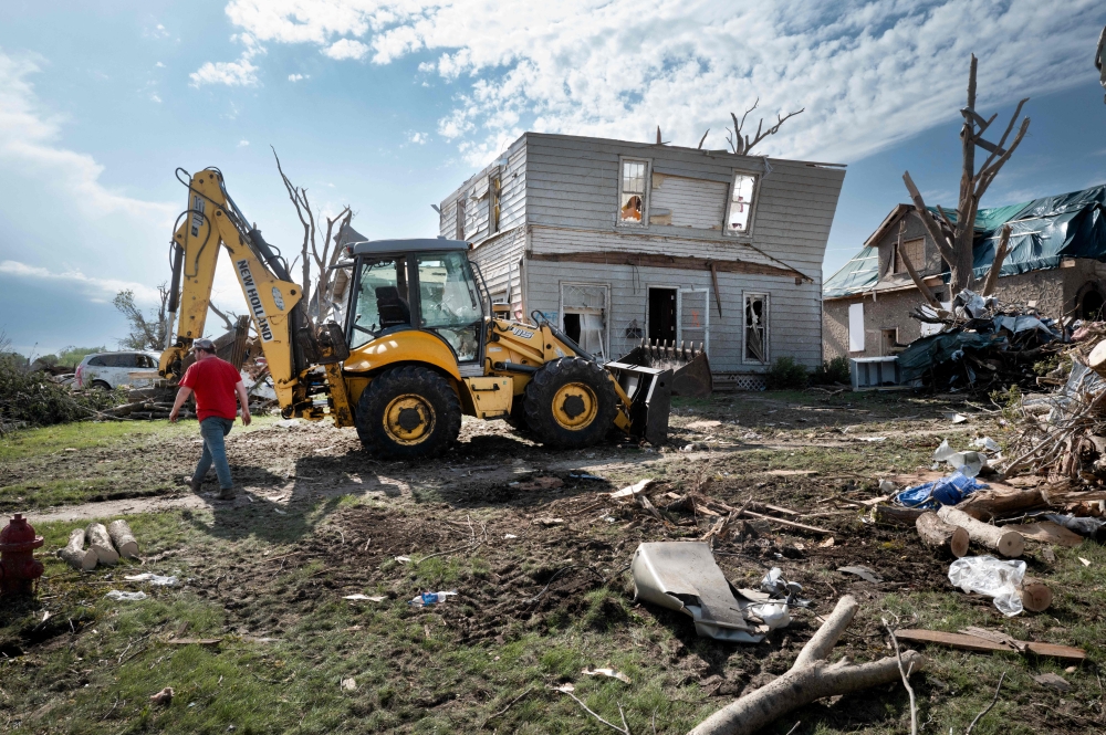 At least 14 people were killed across the central United States as tornadoes and other extreme storms hit several states including Texas, Arkansas and Oklahoma, officials said yesterday. — AFP pic