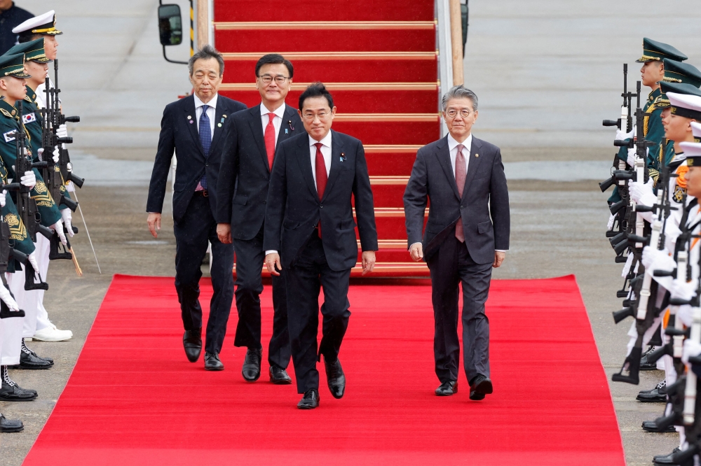 Japanese Prime Minister Fumio Kishida arrives to attend the trilateral summit with his South Korean and Chinese counterparts in Seoul, South Korea May 26, 2024. ― Reuters pic