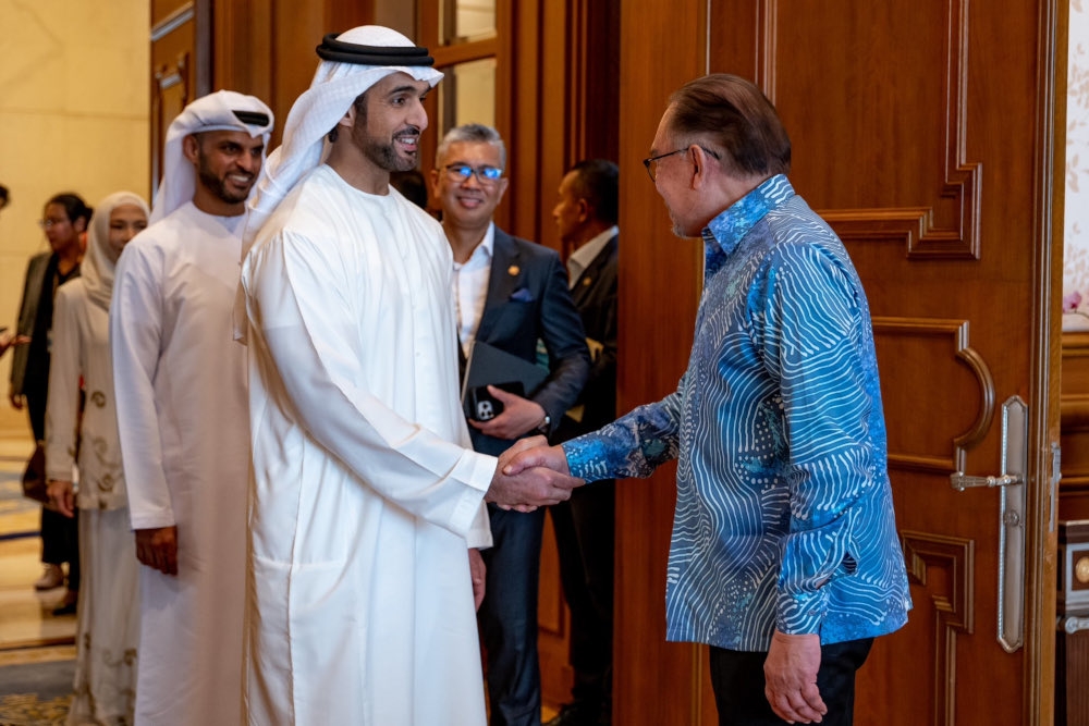 The prime minister received a courtesy visit from Mubadala Energy chief executive officer Sheikh Mansoor Mohamed Al Hamed, accompanied by Minister of Investment, Trade and Industry Datuk Seri Tengku Zafrul Aziz at his office in Putrajaya today. — Picture from X/Anwar Ibrahim  
