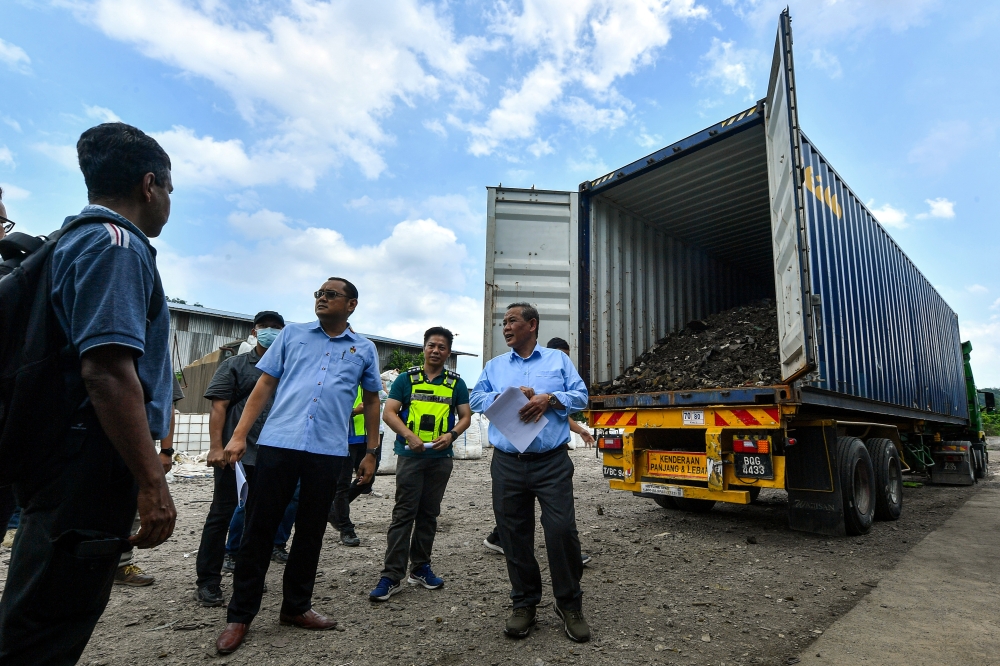 Negeri Sembilan Menteri Besar Datuk Seri Aminuddin Harun during a raid at a factory engaged in conducting illegal stripping of electronic waste in Kampung Ribu, Rantau, May 27, 2024. — Bernama pic   