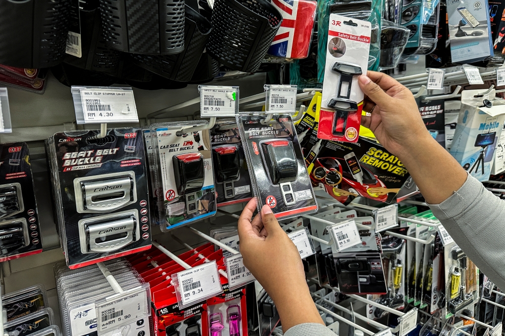 A general view of the various dummy seat belt buckles sold at DIY stores at cheap and affordable prices May 22, 2024. — Picture by Hari Anggara