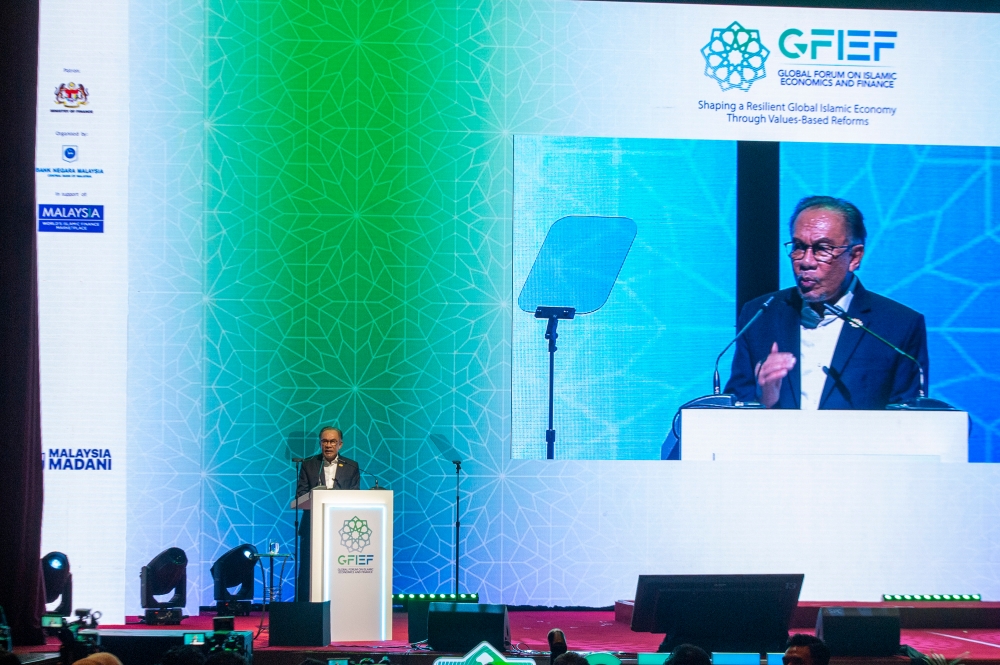 Prime Minister Datuk Seri Anwar Ibrahim delivers his keynote address during the Global Forum on Islamic Economics and Finance at the KL Convention Centre in Kuala Lumpur May 28, 2024. — Picture by Shafwan Zaidon