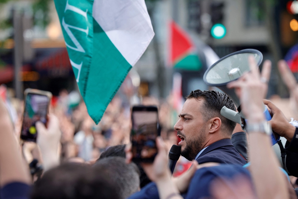 France’s parliament yesterday suspended left-wing lawmaker, Sebastien Delogu. for two weeks after he held up a Palestinian flag during a heated debate over whether France should recognise Palestinian statehood. — AFP pic