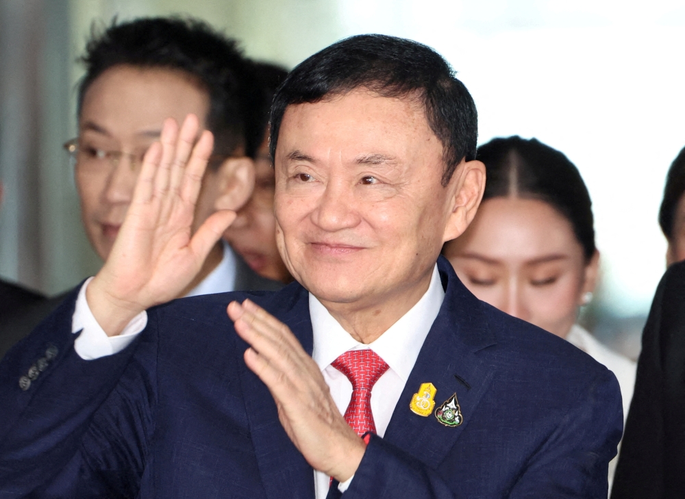 Thailand’s attorney-general will indict former Prime Minister Thaksin Shinawatra for allegedly insulting the monarchy, an official said today, in a setback to a political heavyweight whose loyalists are currently in government. — Reuters pic