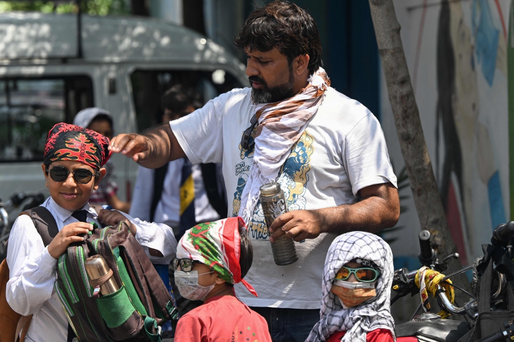 Temperatures in India’s capital soared to a record-high 49.9 degrees Celsius yesterday, the government’s weather bureau said. — AFP pic