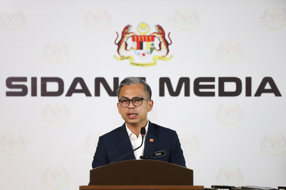 Communications Minister Fahmi Fadzil speaks during the post-Cabinet weekly press conference in Putrajaya, May 29, 2024. — Picture by Miera Zulyana