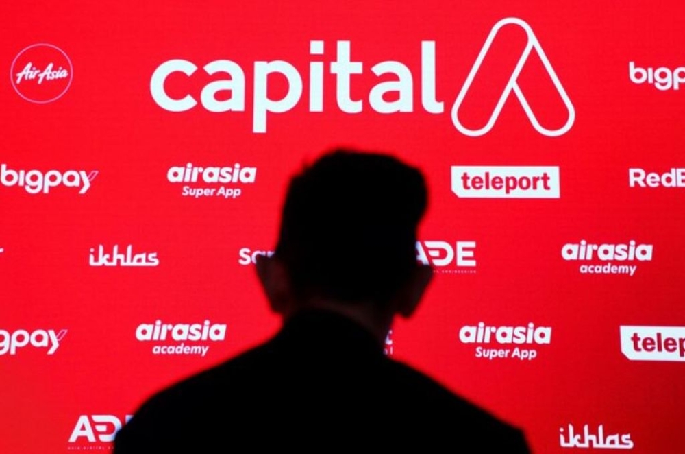Capital A Berhad's logo is seen among its subsidiary companies during a ceremony announcing a name change of the group holding company from AirAsia Group Berhad, in Kuala Lumpur, Malaysia, January 28, 2022. — Reuters pic