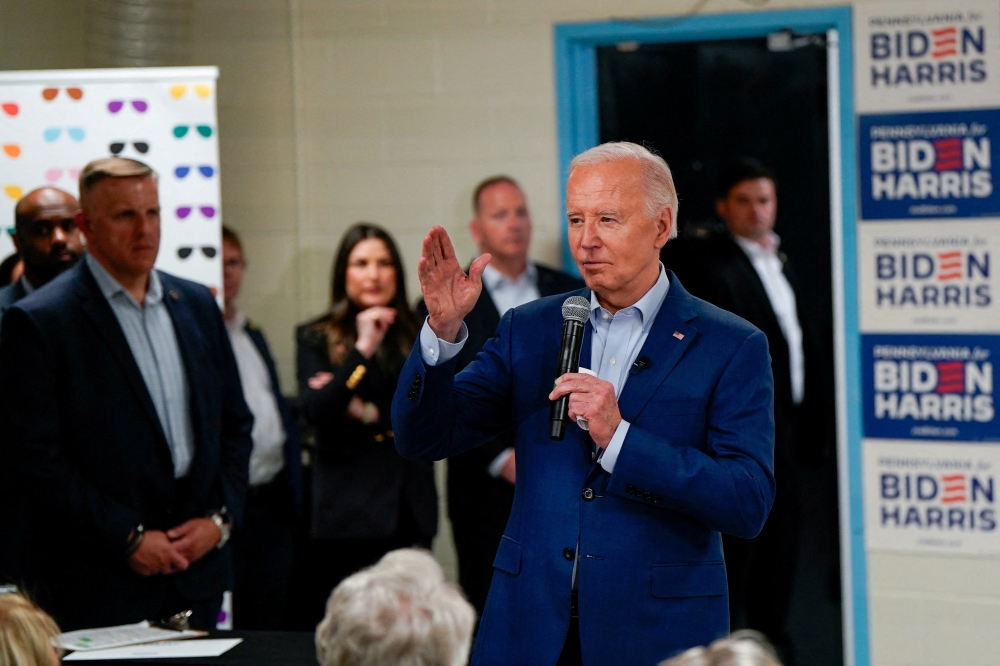 US President Joe Biden participates in a Canvas Kickoff event with campaign volunteers at the Martin Luther King Recreation Centre in Philadelphia, Pennsylvania April 18, 2024. — Reuters pic