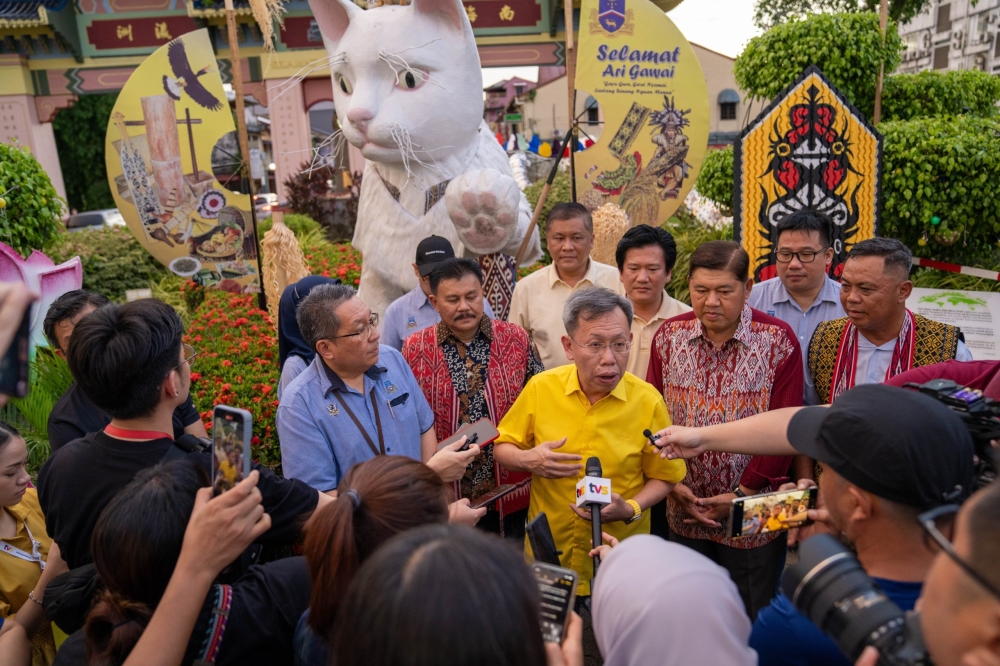 Dr Sim speaks to reporters at the White Cat Statue Gawai Dayak lighting-up ceremony on May 29, 2024. ― Picture by Chimon Upon via The Borneo Post
