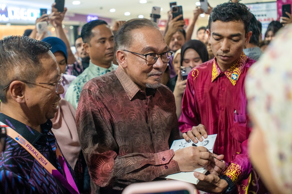 Prime Minister Datuk Seri Anwar Ibrahim attends the KL International Book Fair at World Trade Centre, Kuala Lumpur, May 30, 2024. — Picture by Shafwan Zaidon