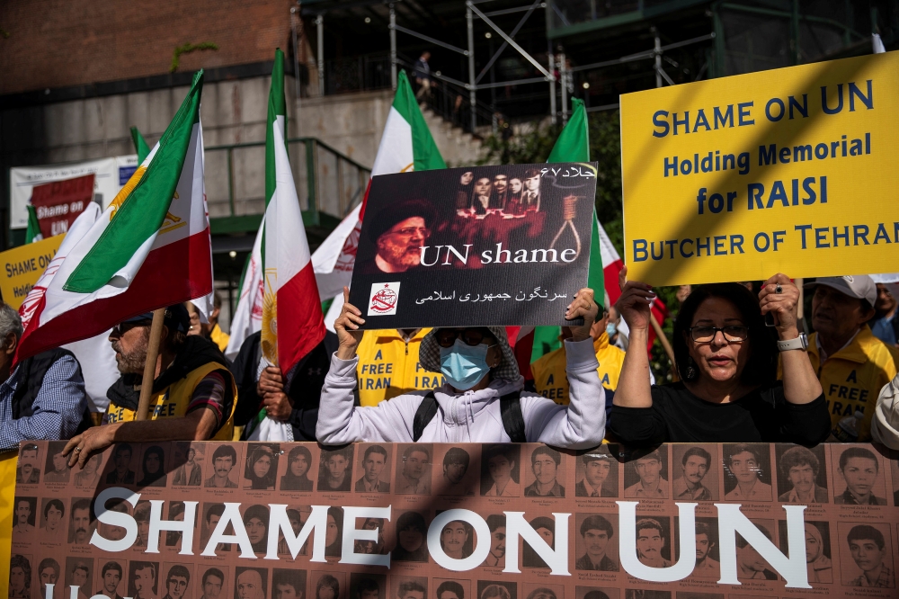 Outside the UN headquarters in New York several dozen protesters opposed to the Iranian authorities chanted ‘shame on UN’. — Reuters pic