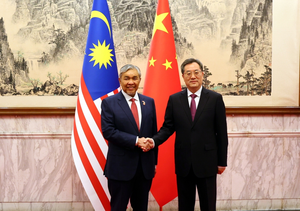 Deputy Prime Minister Datuk Seri Ahmad Zahid Hamidi meets China's Vice Premier Ding Xuexiang in Beijing May 31, 2024. ― Bernama pic