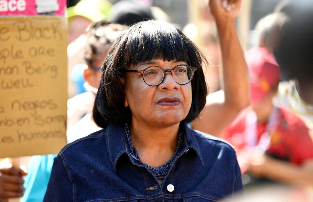 British Labour MP Diane Abbott takes part in a demonstration against racism outside Downing Street in London July 17, 2021. — Reuters pic  