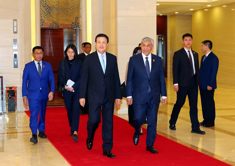 Deputy Prime Minister Datuk Seri Ahmad Zahid Hamidi with China’s State Councillor and Public Security Minister Wang Xiaohong in Beijing, May 31, 2024. — Bernama pic    