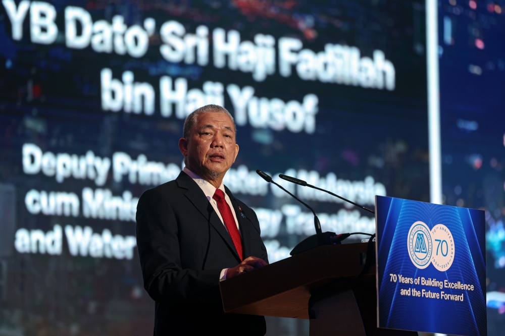 Deputy Prime Minister Datuk Seri Fadillah Yusof delivers his speech at the 70th Master Builders Association Malaysia anniversary dinner celebration in Kuala Lumpur, May 31, 2024. — Bernama pic 