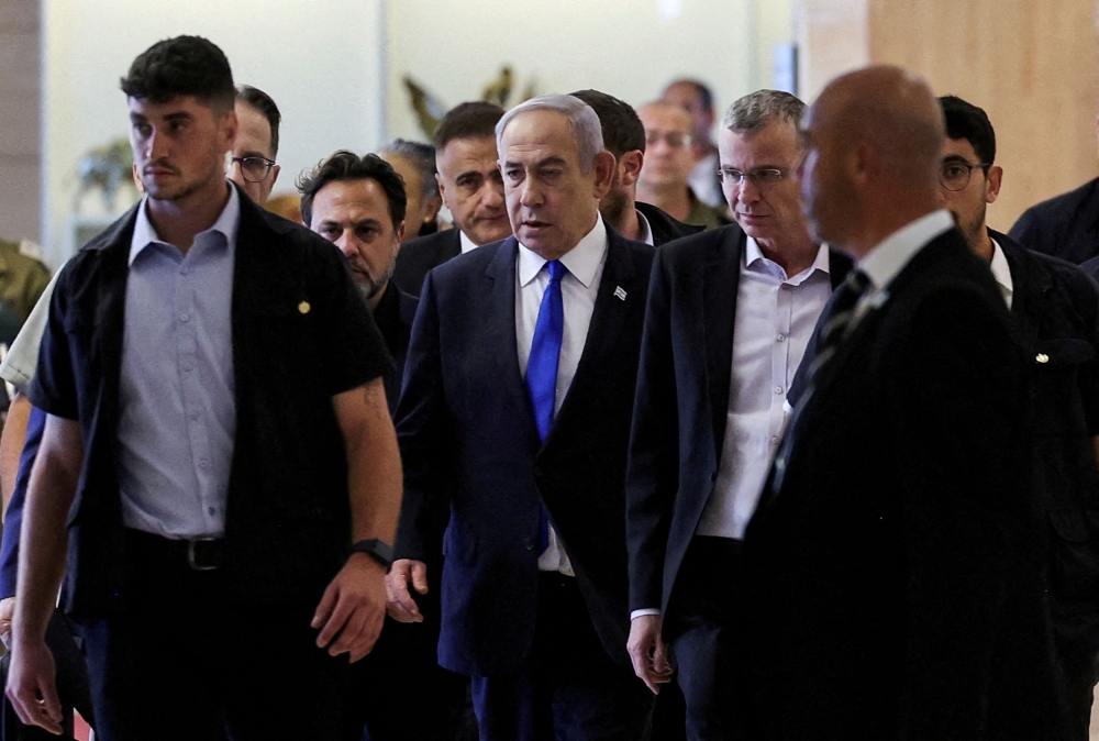 File photo of Israeli Prime Minister Benjamin Netanyahu arriving to his Likud party faction meeting at the Knesset, Israel's parliament, in Jerusalem May 20, 2024. — Reuters pic