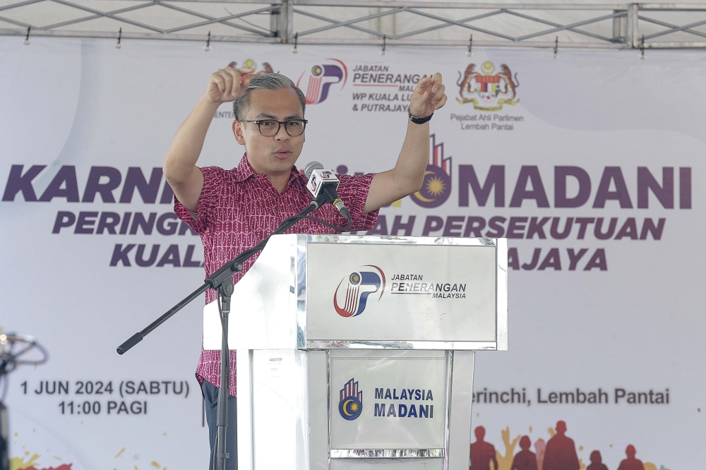Communications Minister Fahmi Fadzil said a comprehensive discussion among four key ministries has been held to strategise and develop an action plan for the implementation of the second 5G network. — Picture by Sayuti Zainudin 