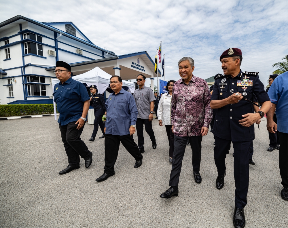 Deputy Prime Minister Datuk Seri Ahmad Zahid Hamidi and Perak police chief Datuk Seri Mohd Yusri Hassan Basri (right) at the launch of the Bagan Datuk District Police Headquarters (IPD) June 2, 2024. — Bernama pic