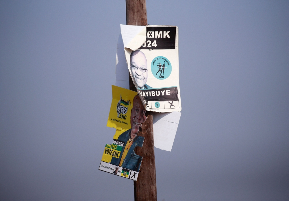 Posters of the African National Congress (ANC) and uMkhonto weSizwe (MK) are seen near the house of South Africa's former President Jacob Zuma, in Nkandla, South Africa, June 2, 2024. — Reuters pic