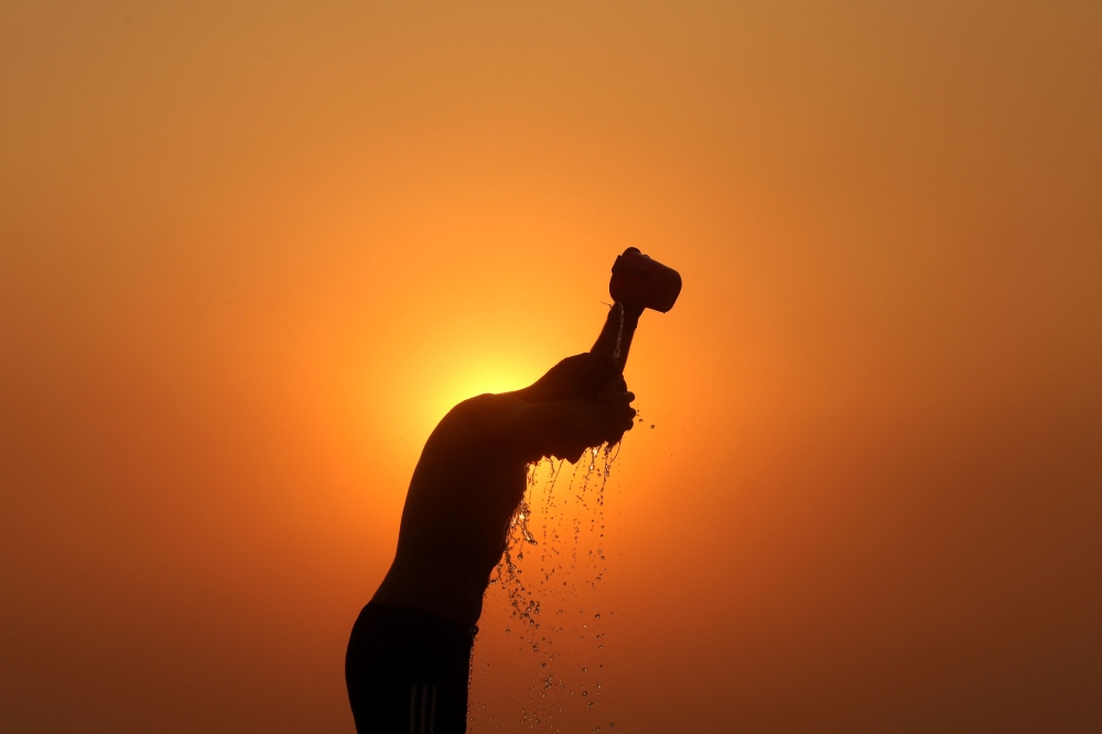 India saw nearly 25,000 cases of suspected heatstroke and 56 people lost their lives after several heatwave days across the country from March-May, local media reported, citing government data. — AFP pic