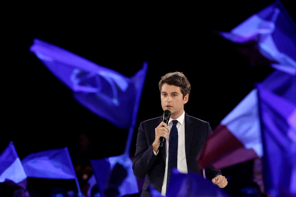 France’s Prime Minister Gabriel Attal (centre) addresses the audience during the final campaign rally of France’s group Renew (Renaissance), Modem and Horizons party leading European Parliament election candidate and MEP Valerie Hayer in Aubervilliers June 1, 2024, ahead of the upcoming European Parliament elections. — AFP pic