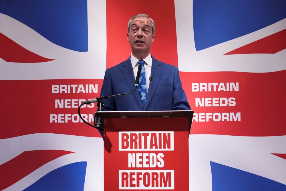 Honorary President of the Reform UK party Nigel Farage speaks during a press conference in London June 3, 2024. — Reuters pic  