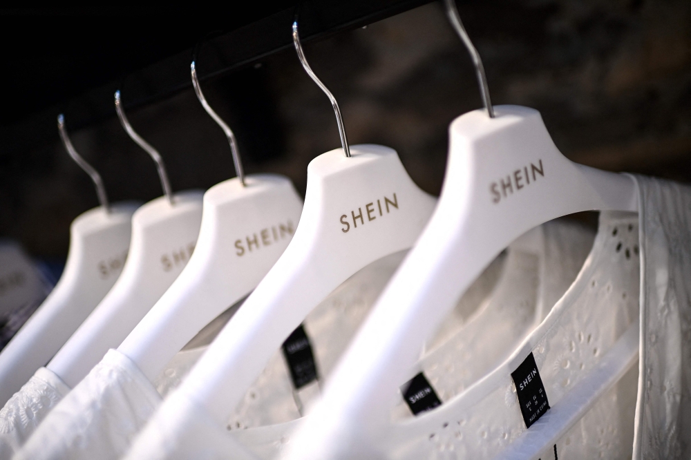 According to reports, Shein, the Chinese-founded online fast-fashion giant, could issue plans this week for a London stock market listing valuing it at £50 billion (RM301.5 billion). ― AFP pic