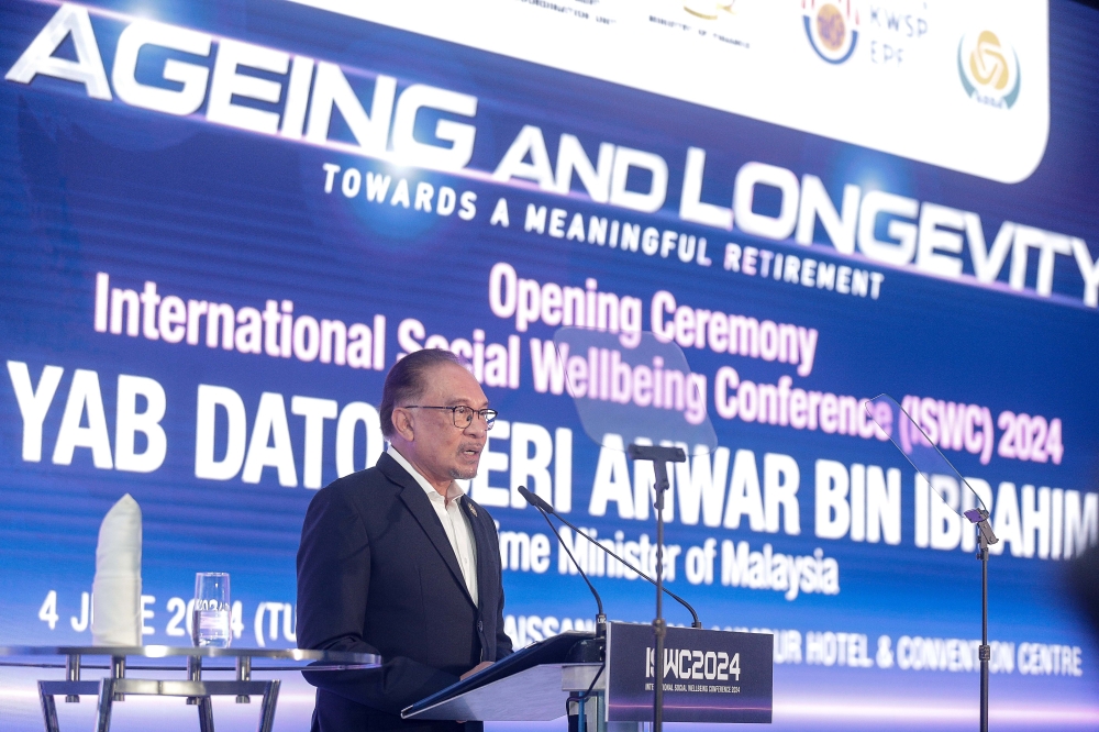 Prime Minister Datuk Seri Anwar Ibrahim delivers a speech at the opening ceremony of the International Social Wellbeing Conference 2024 in Kuala Lumpur June 4, 2024. — Picture by Sayuti Zainudin